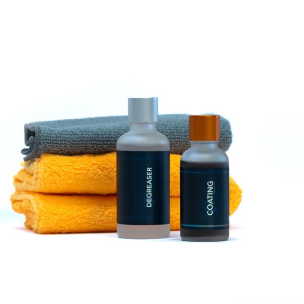 Flesjes Coating en Degreaser met daarachter de Prep Cloth en Applicator